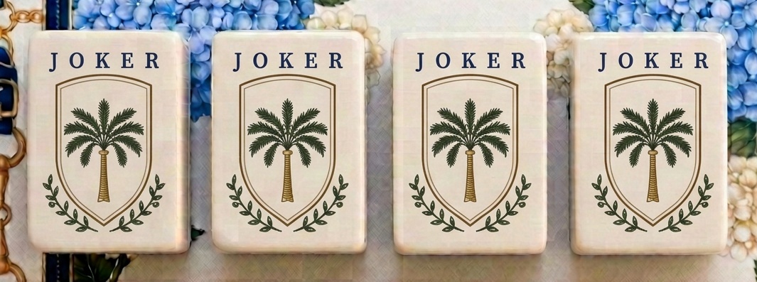 Coastal Tile Society joker tiles with palm crest on the Newport mat